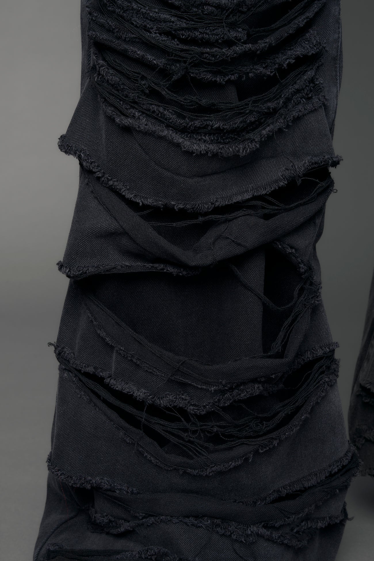 black wash distressed denim pants 