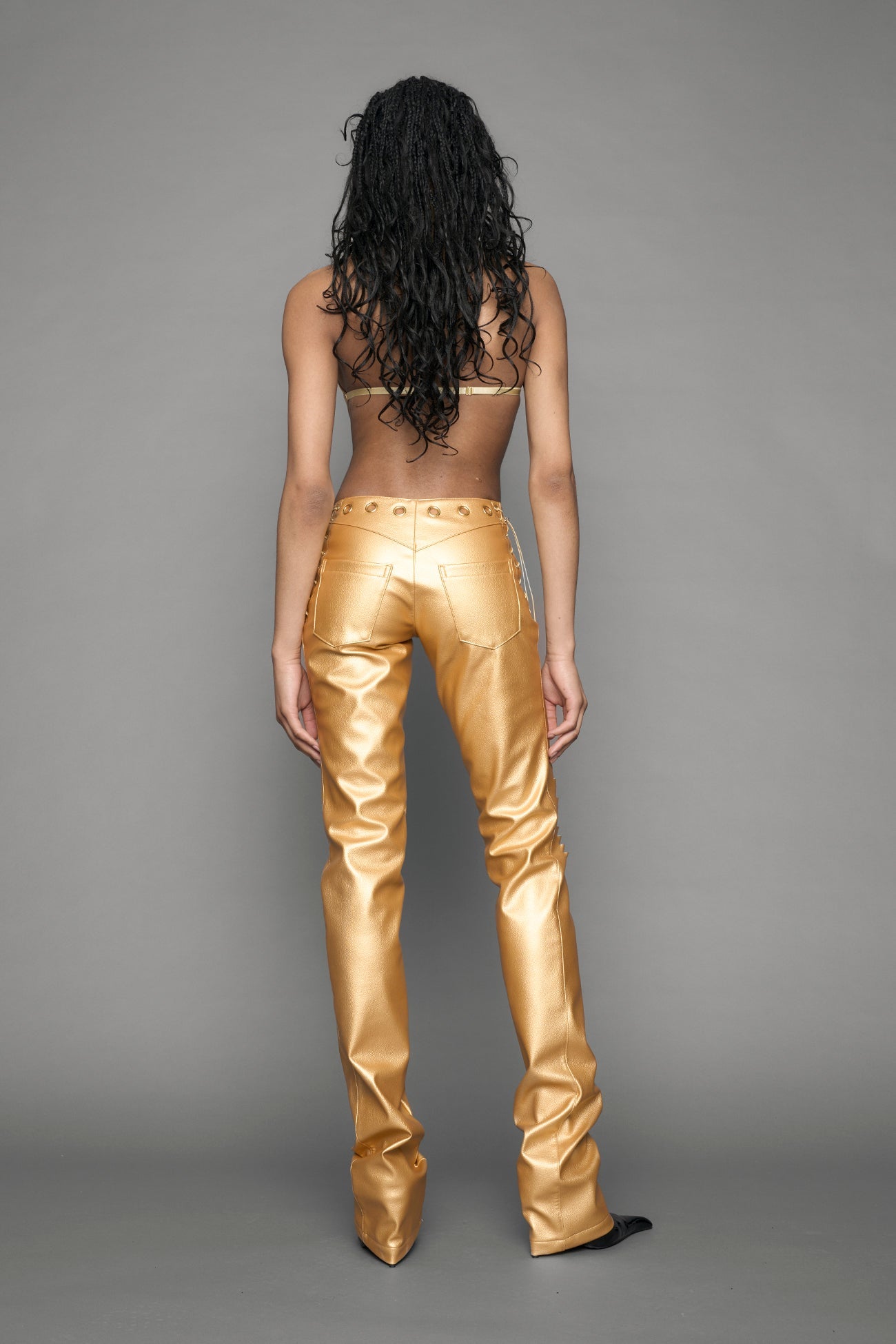 gold vegan leather pants with cuts