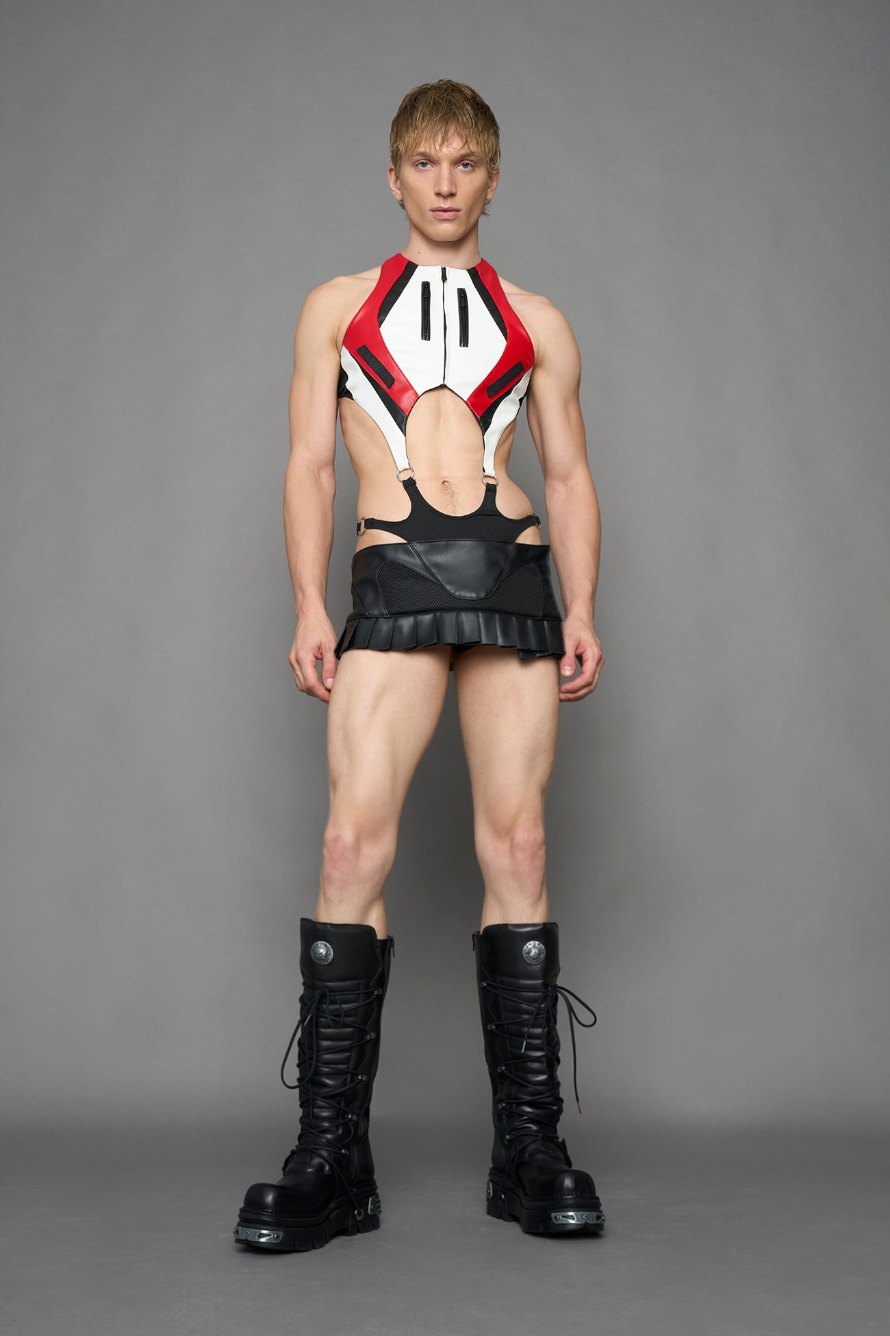 model wearing red white black moto inspired cut out body