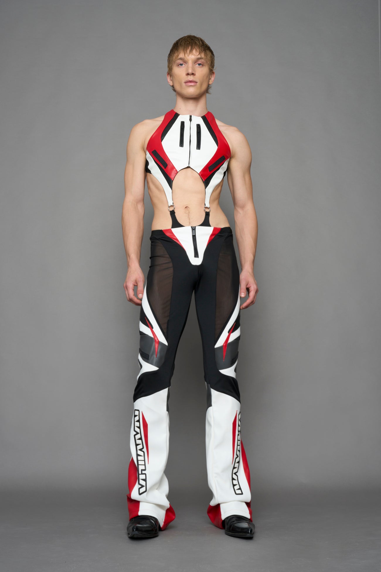 model wearing red white black moto inspired cut out body